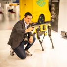 Speaker taking a picture with Spot