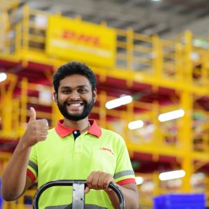 DHL employee in India in warehouse