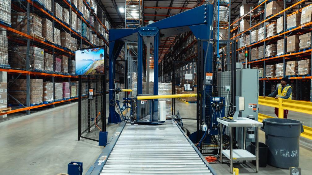 A pallet wrapper in a DHL warehouse.