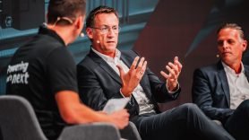 Panel speaker in discussion on-stage