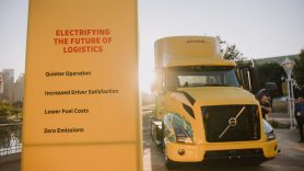 DHL van backlit by morning sun