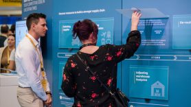 Delegates explore interactive exhibit