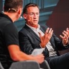 Panel speaker in discussion on-stage