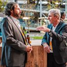 Two men network outside of DHL Innovation Center