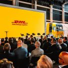 Image of DHL New Energy Logistics logo on stage