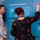 Delegates explore interactive exhibit