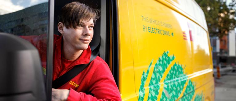 Christian Digby behind the wheel of his van