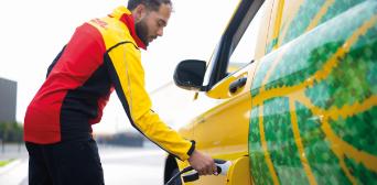 DHL driver refuels his van