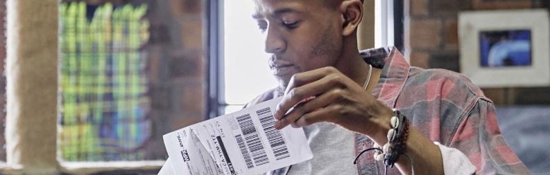 Man sticks a label on