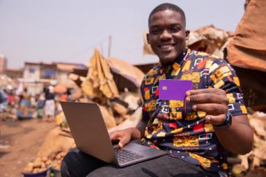 Man with laptop and credit card