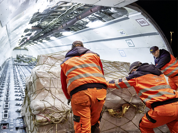 Workers Loading Cargo Aircraft