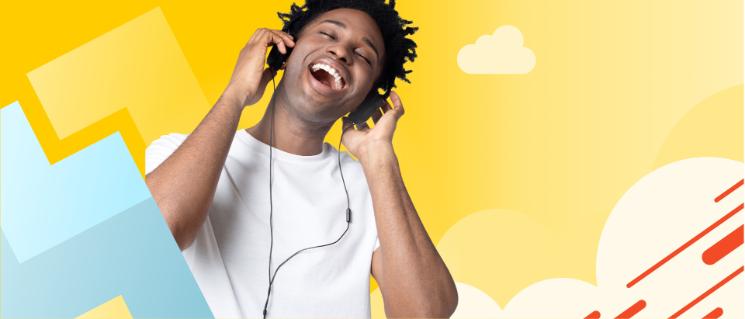 Man happy with purchased headphones listening to music.
