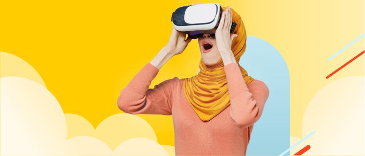 Woman holding a virtual reality device in her face and showing surprise.