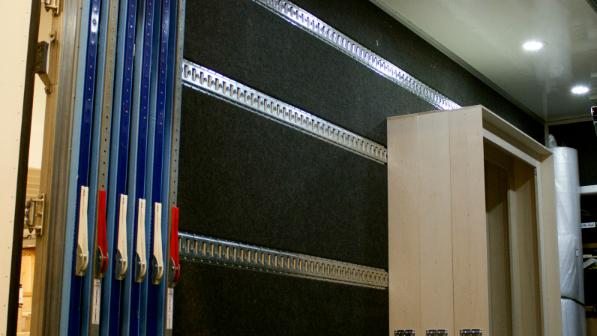 The inside of a truck ready to transport artwork.