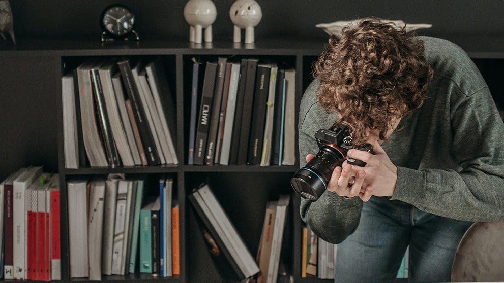 man taking photographs