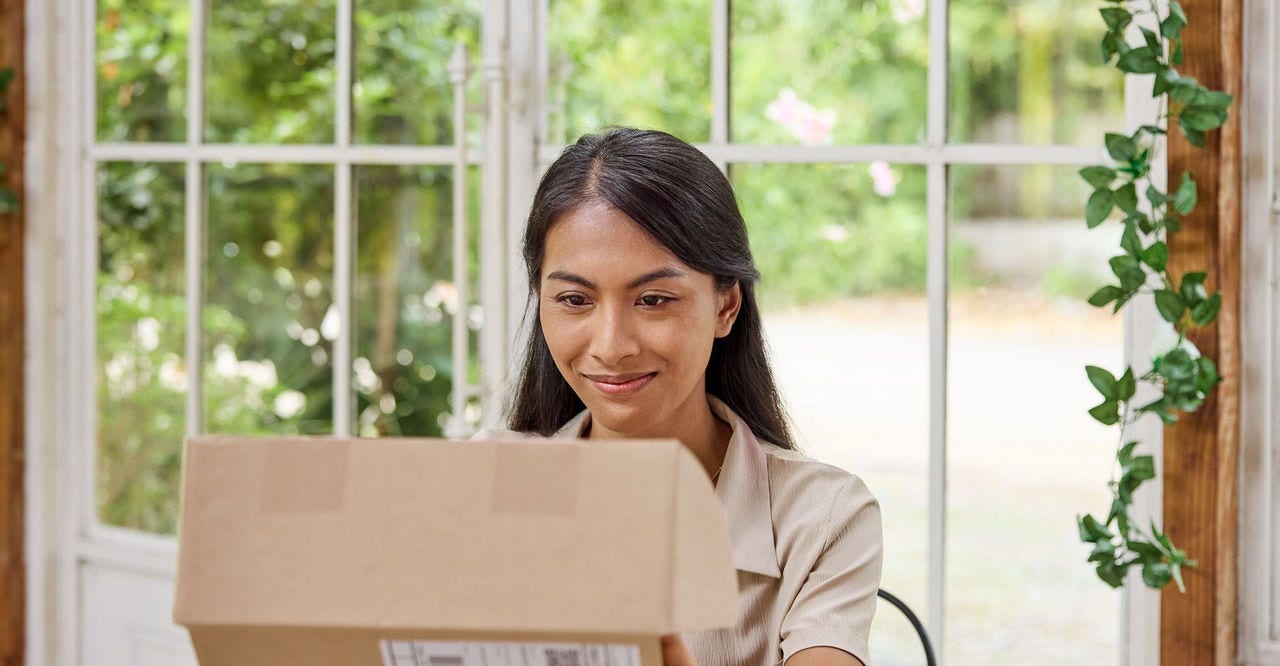 woman receiving fragile parcel