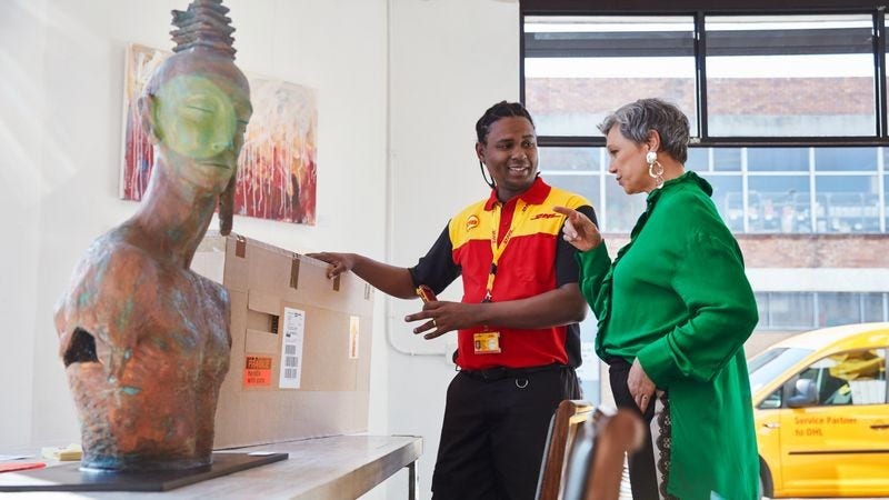 dhl courier providing advice to jeweller