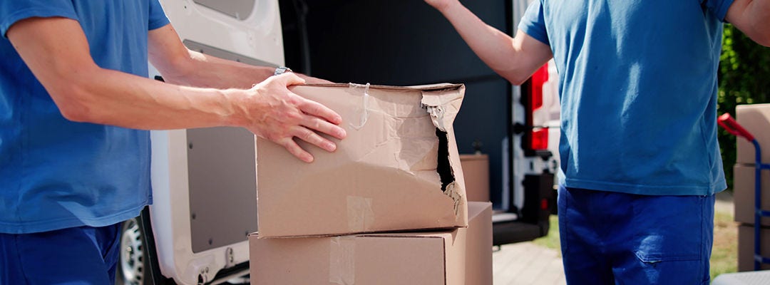 Delivery Mishap: Box Smashed By Careless Mailman, Business Shipment Ruined