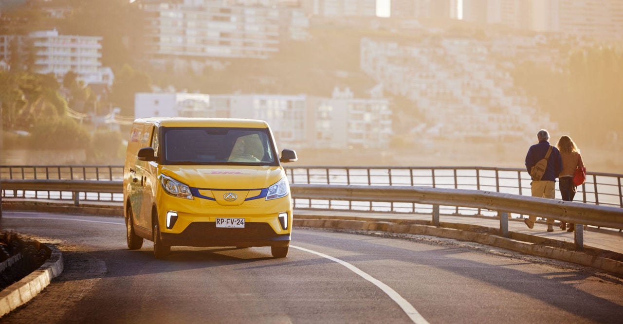 dhl express australia van on the road