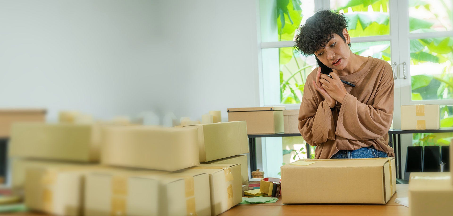 woman packing boxes