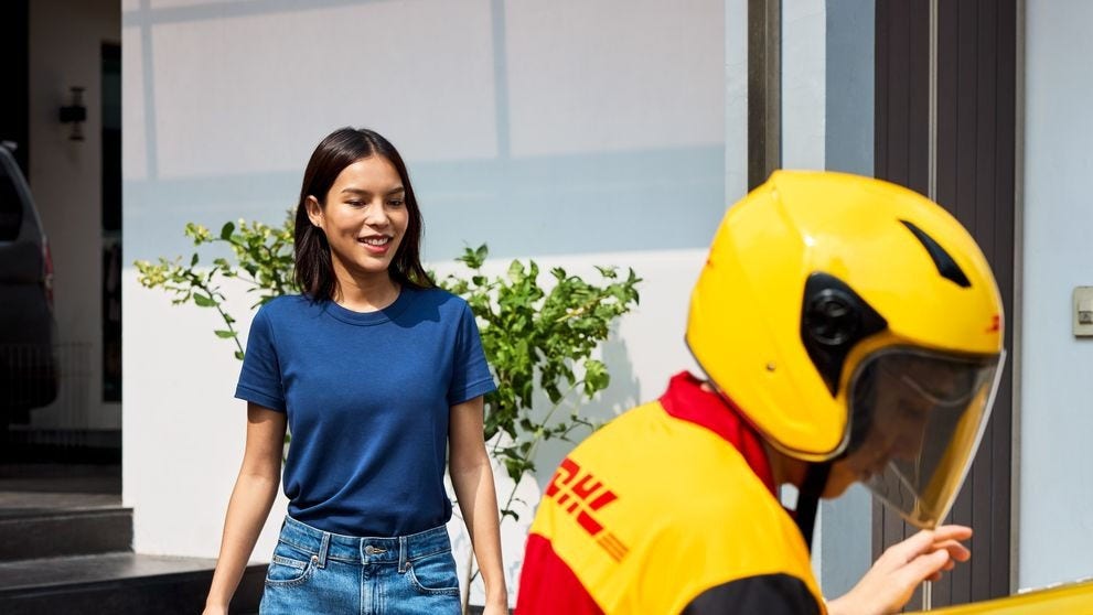 A business owner collecting her express imports