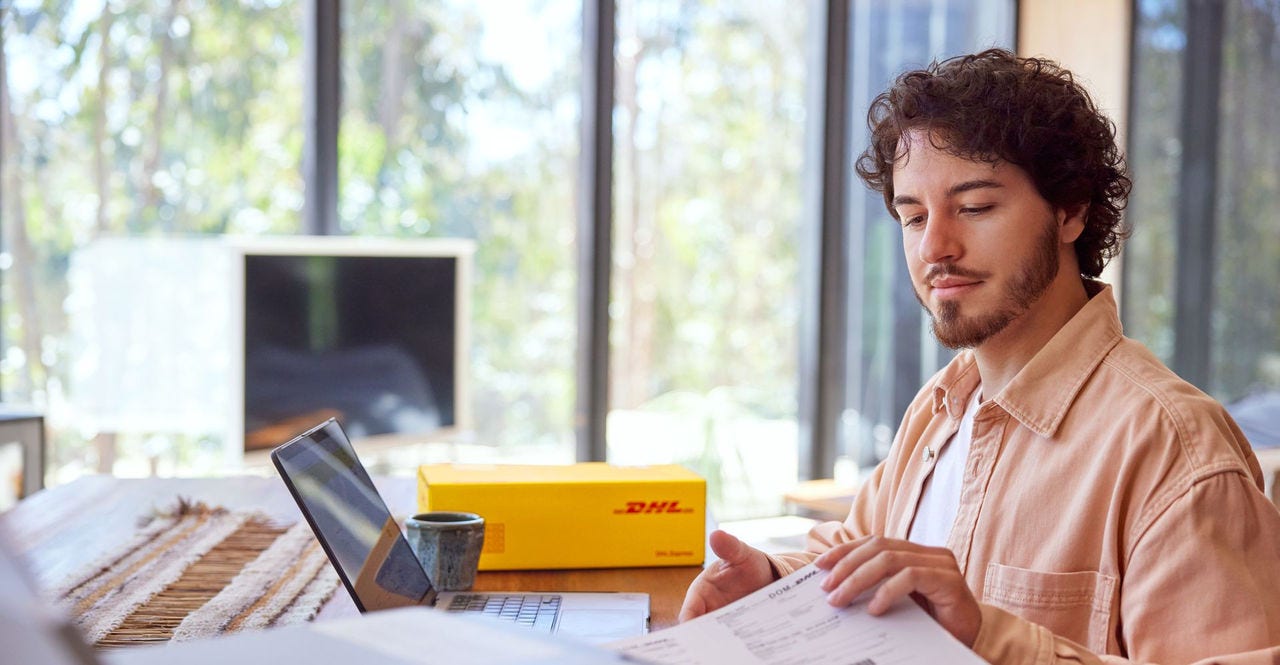 a man preparing the import documents required for customs clearance in India