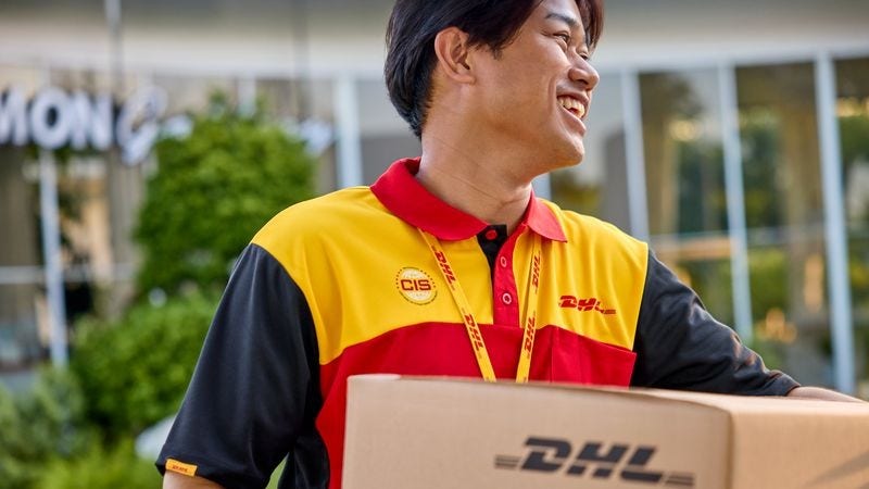 A DHL logistics employee delivering a medical parcel