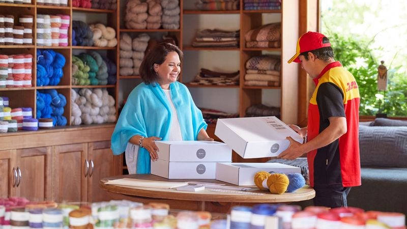 a business owner seeking the help of DHL to meet peak season demand