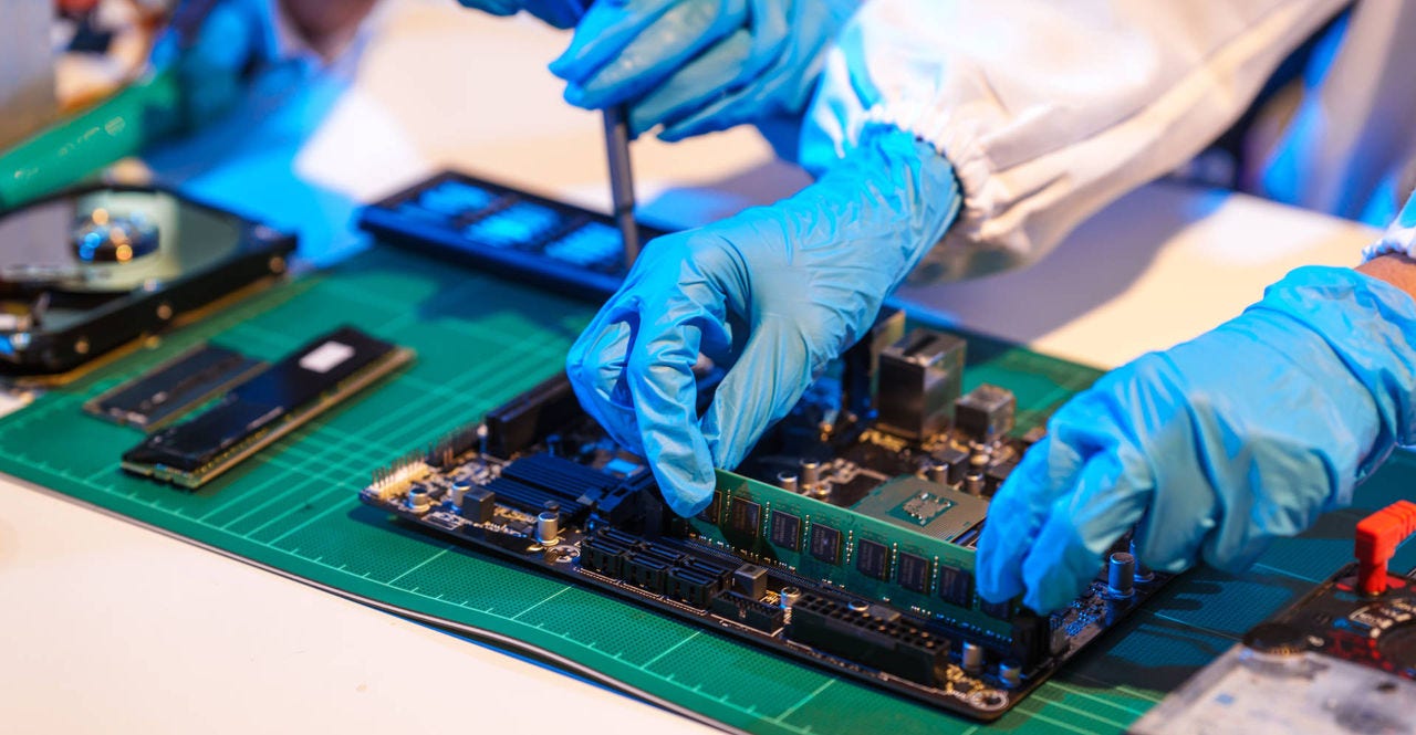 semiconductor electronic components being assembled in a factory in indonesia
