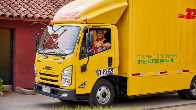 dhl vehicles promoting sustainable shipping