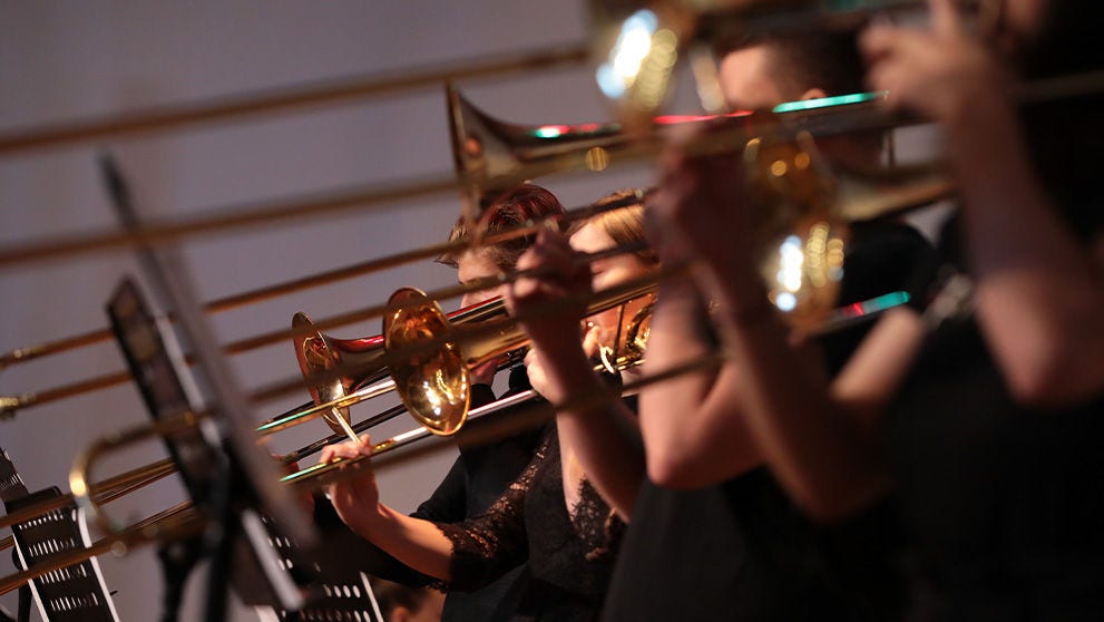 people playing trumpets
