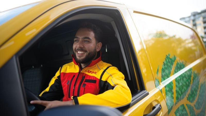 dhl express courier delivering auto components