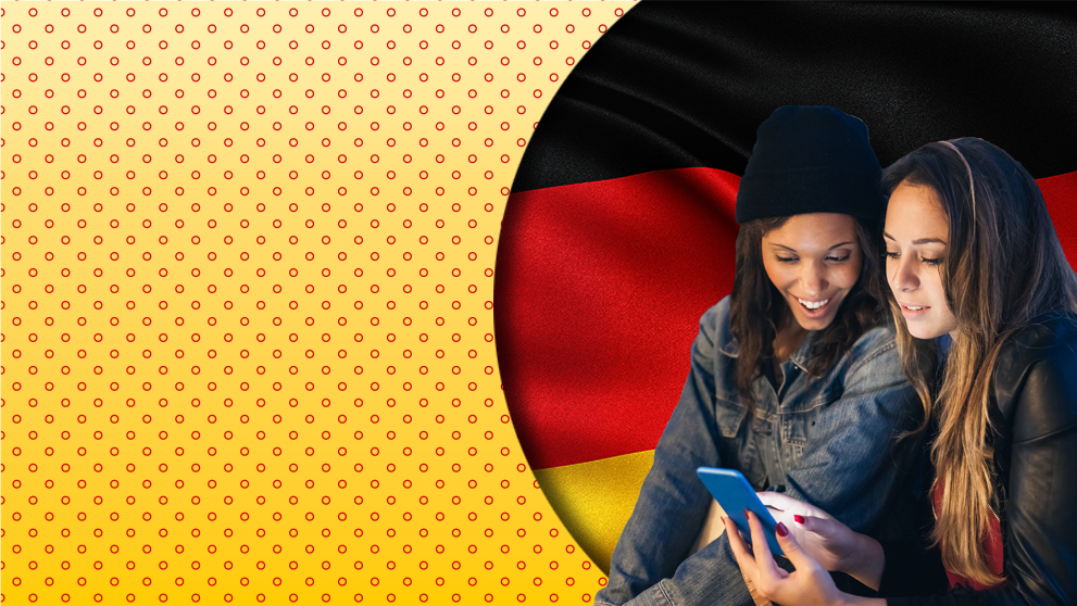 two ladies looking at mobile screen