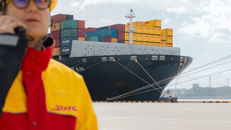 dhl staff facilitating shipping exports