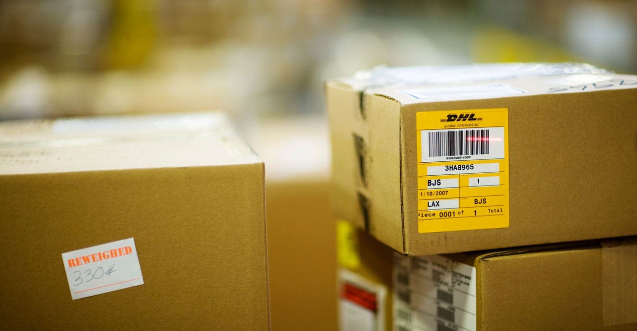 parcel being scanned and prepped to go through customs