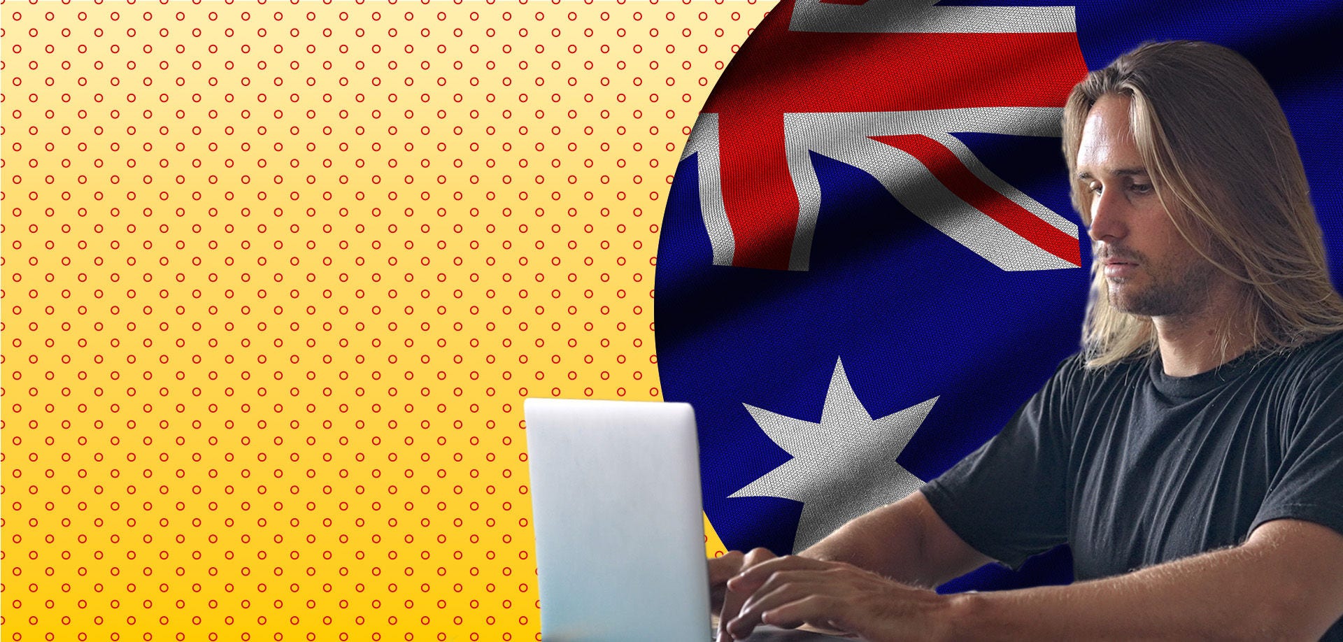 man typing on laptop