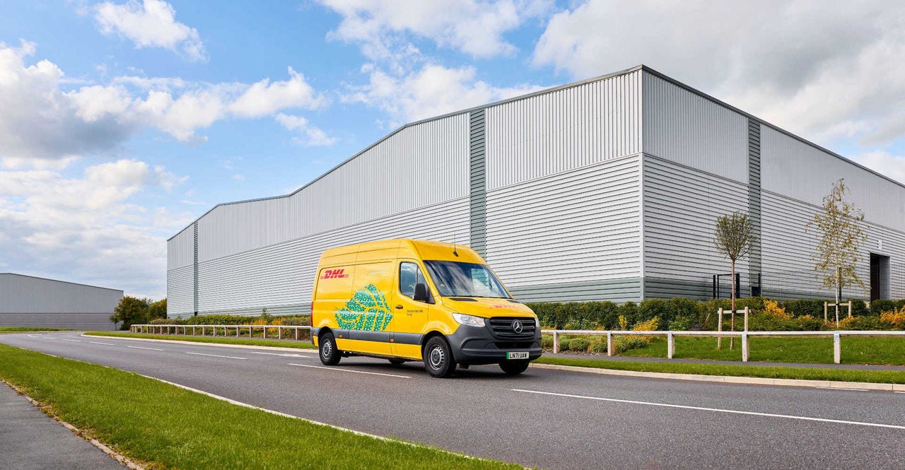 dhl express van on a road