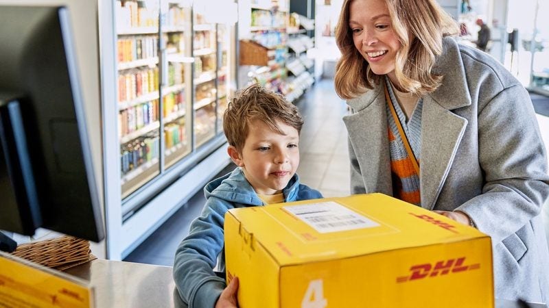 mother and son collecting a mother’s day gift shipped by dhl express