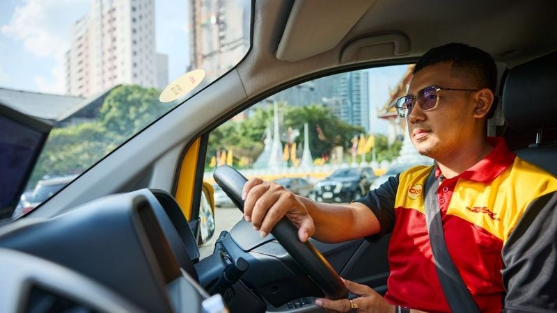 A DHL employee delivering live shopping products