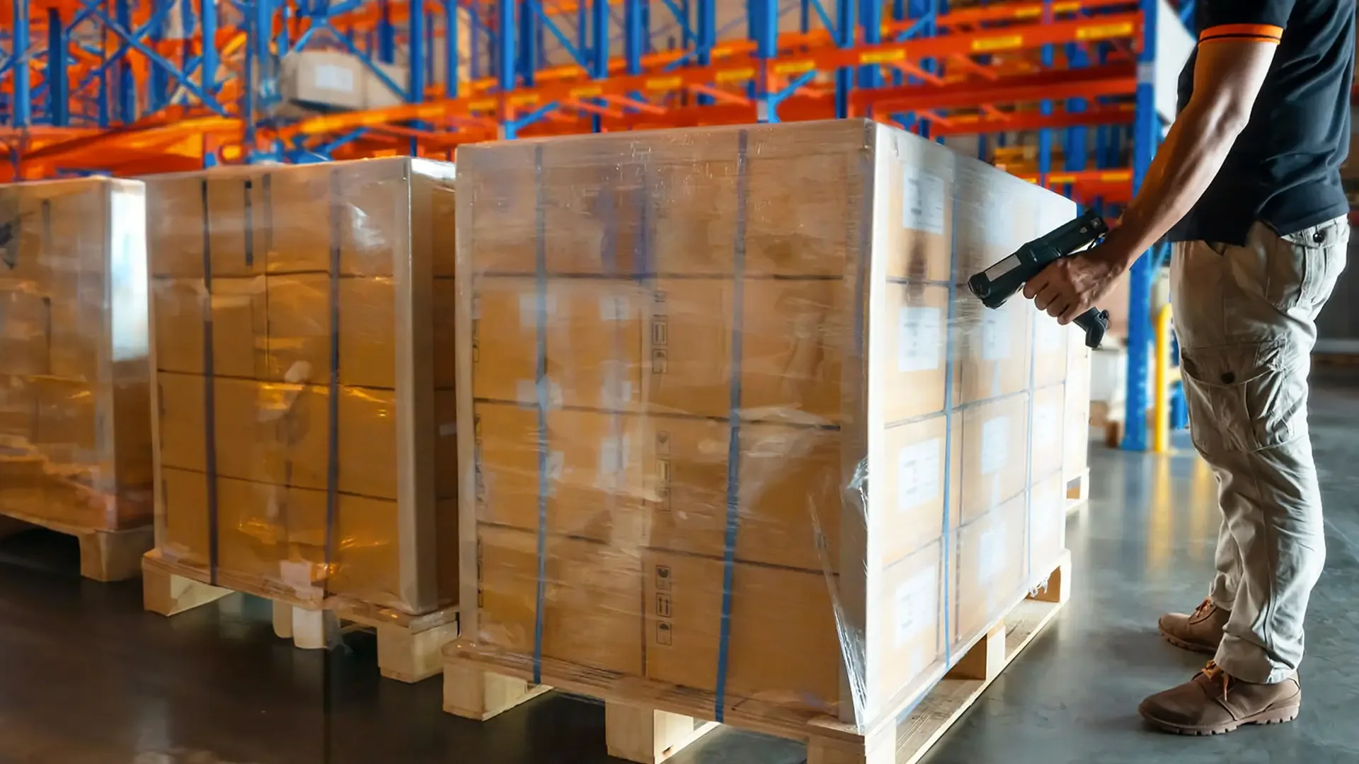 man scanning packages