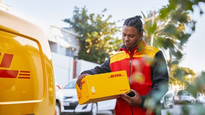 dhl express employee providing dependable shipping services to bangladesh