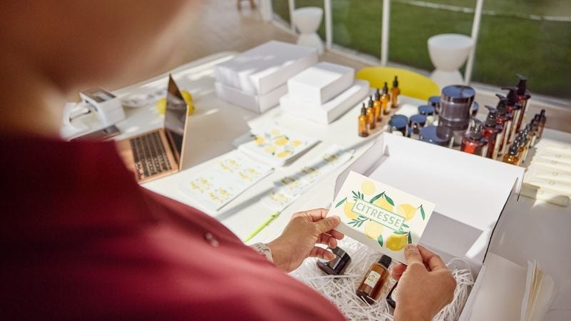 A person opening a parcel.