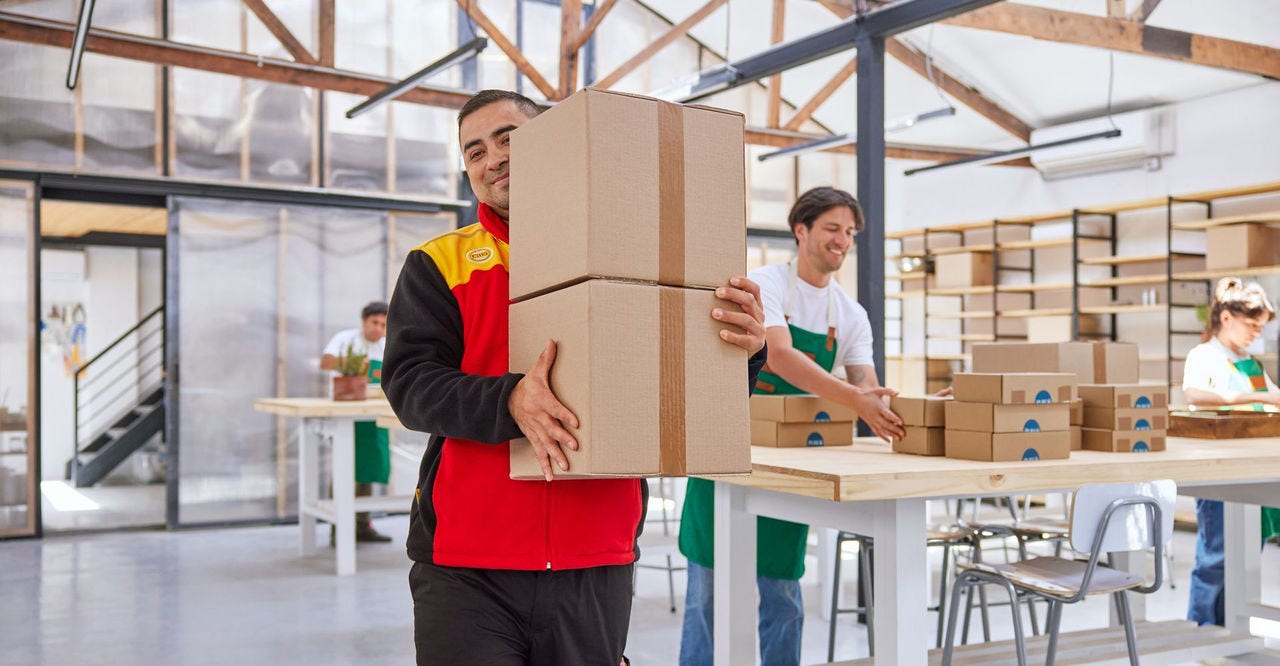 dhl employee delivering an order to an overseas customer