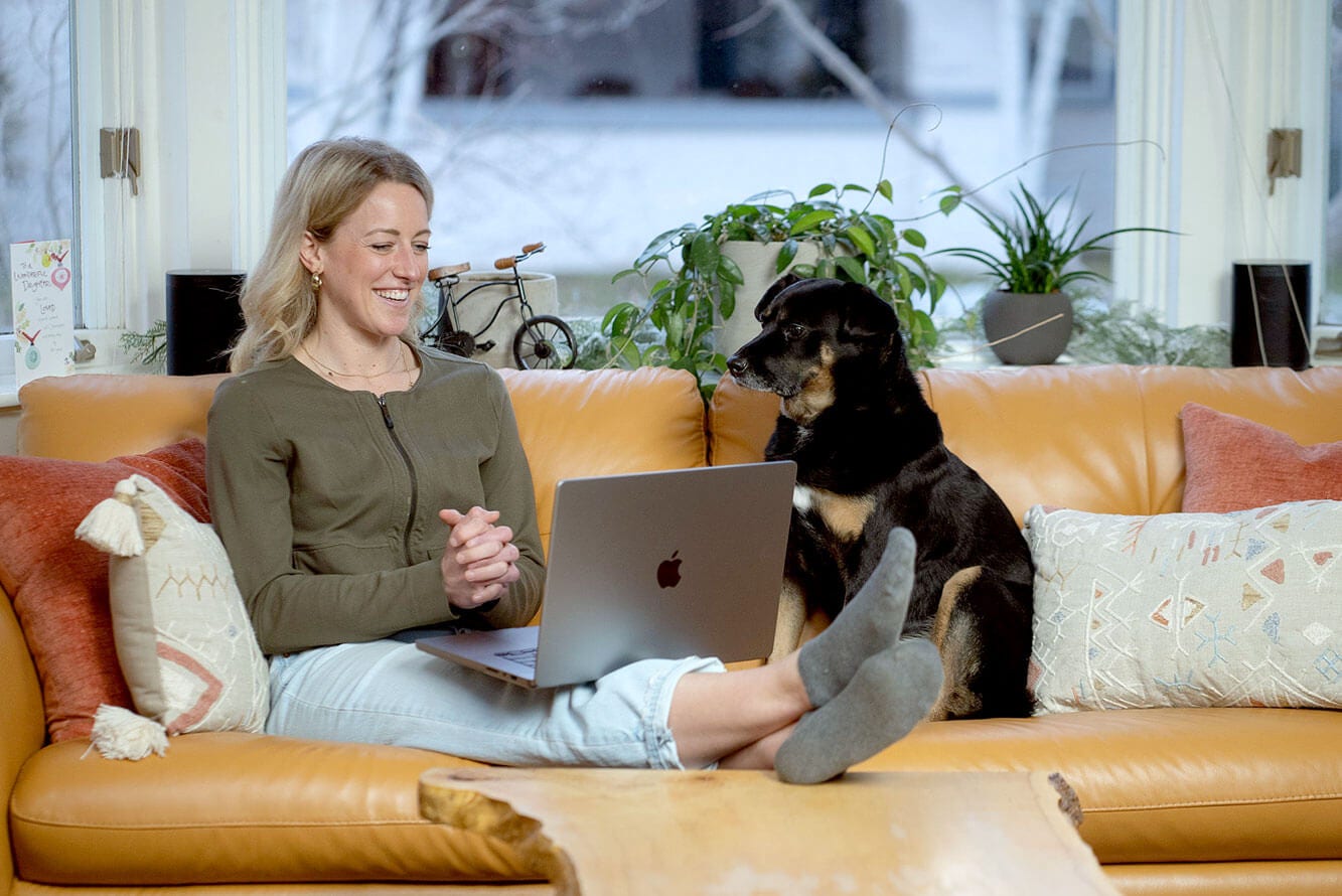 Kelsey working from home with her dog Kelsey working from home with her dog
