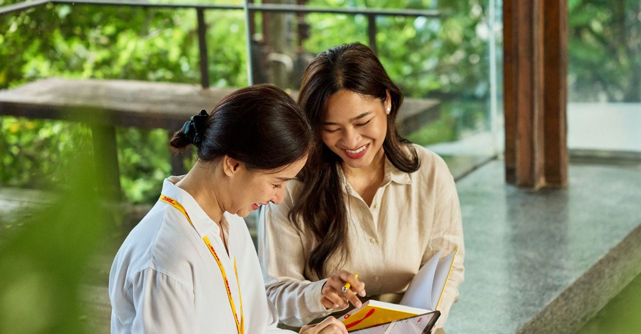 an employee actively gathering customer feedback