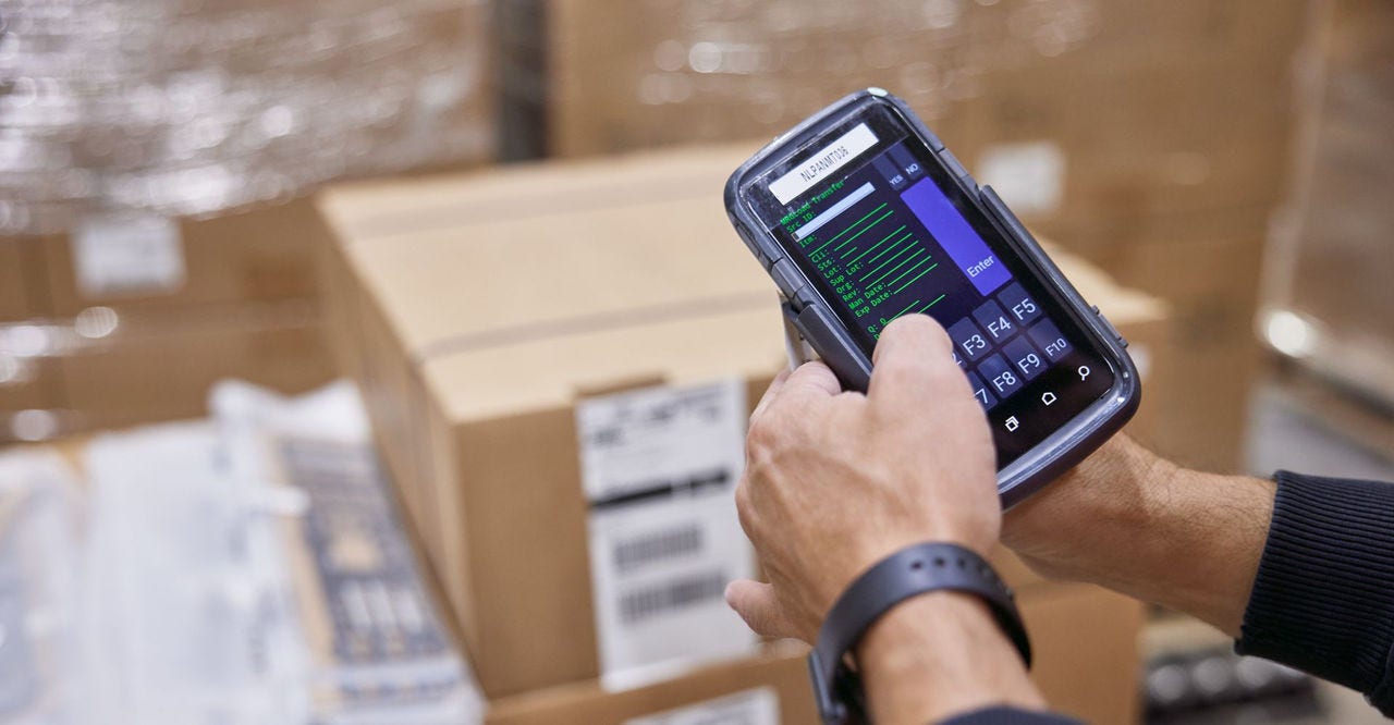 logistics employee scanning an item