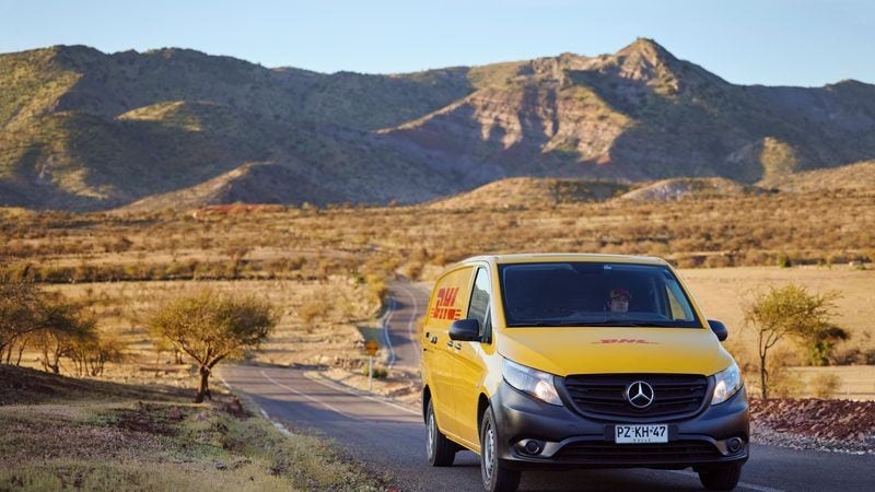 DHL’s international shipping van en route to delivery 