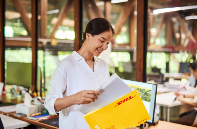 business owners reviewing a stack of documents