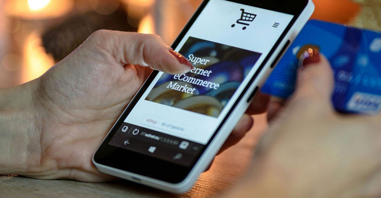 woman browsing popular e-commerce products in Cambodia on her phone