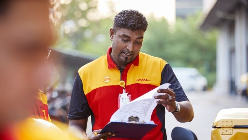 DHL-employee-with-clipboard